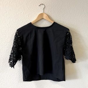 Black blouse with lace sleeves, size M